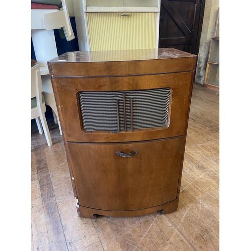 1342 - A 1950s dining room suite, comprising a sideboard, four chairs and a drop leaf table, a 1920s record... 