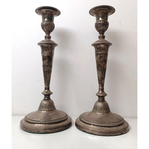 406 - A pair of George III silver candlesticks, London 1809, 33 cm high (2)