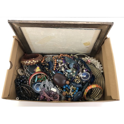 748 - Assorted costume jewellery and a silver photograph frame