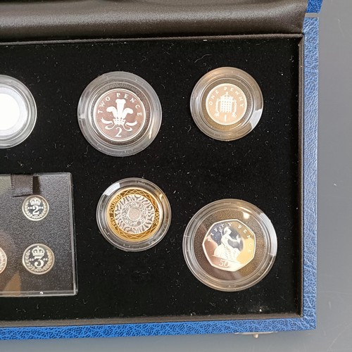 802 - A silver proof coin set, commemorating The Queen's 80th Birthday Collection, cased