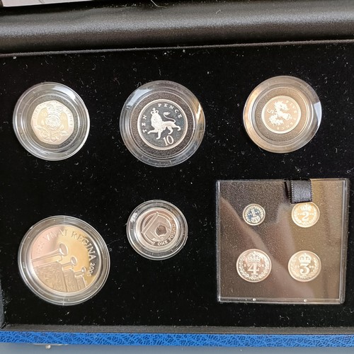 802 - A silver proof coin set, commemorating The Queen's 80th Birthday Collection, cased