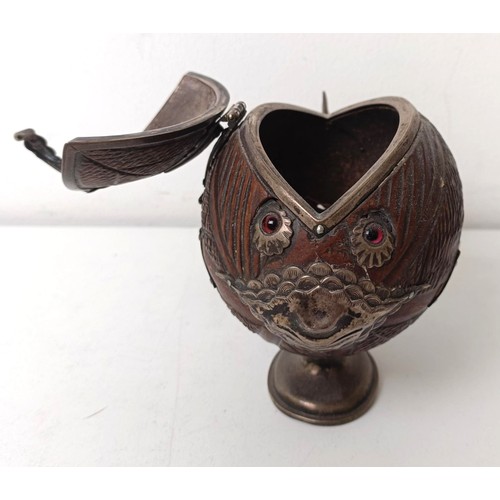 420 - A 19th century novelty box carved from a coconut, in the form of a fish, with silver coloured metal ... 