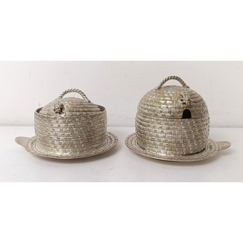 428 - A pair of silver plated honey pots, in the form of beehives, 13 cm wide