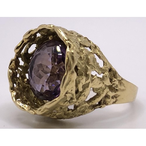 549 - ***Regretfully withdrawn*** An 18ct gold and amethyst abstract ring, by John Donald, ring size Q, am... 