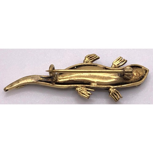 690 - An early 20th century paste set lizard brooch, in a vintage jewellery box