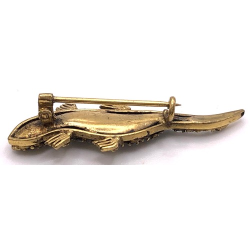 690 - An early 20th century paste set lizard brooch, in a vintage jewellery box