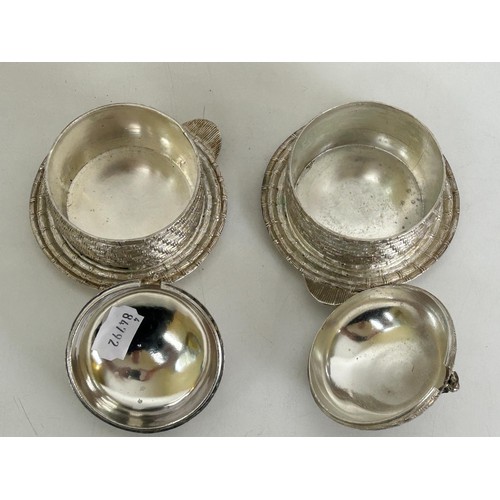 428 - A pair of silver plated honey pots, in the form of beehives, 13 cm wide