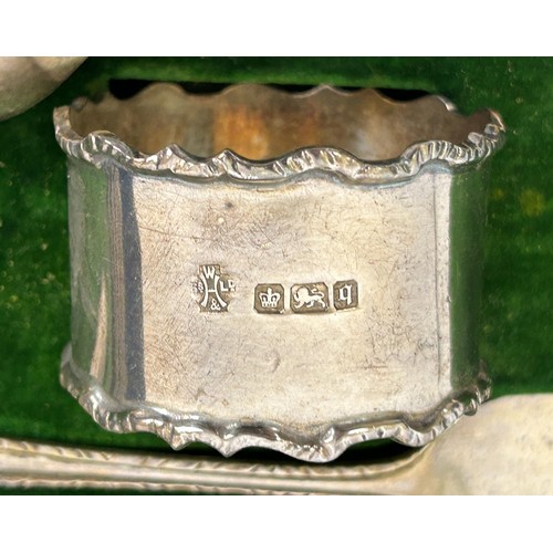 434 - A set of six Art Deco silver cake forks, cased, a fork, spoon and napkin ring, cased, a set of six A... 