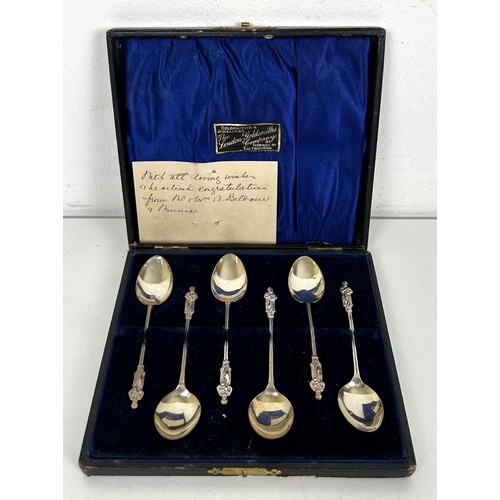 434 - A set of six Art Deco silver cake forks, cased, a fork, spoon and napkin ring, cased, a set of six A... 