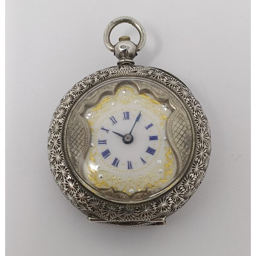 315 - A silver perfume bottle, a miniature hand mirror, and a ladies open face pocket watch (3)