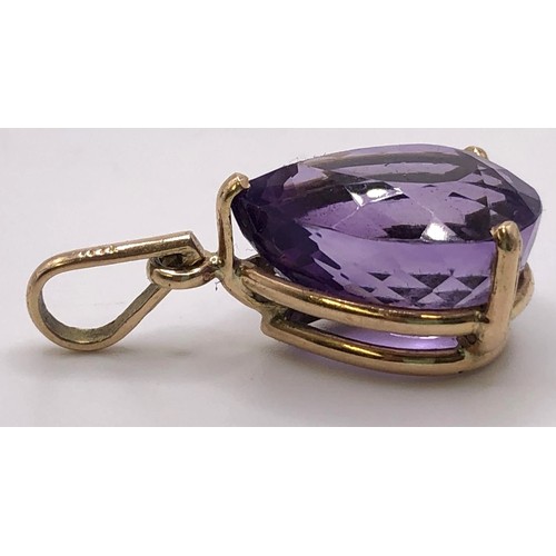 754A - A 14ct gold amethyst pendant