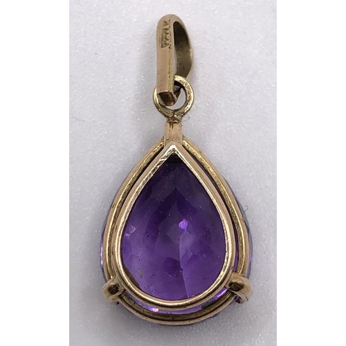 754A - A 14ct gold amethyst pendant