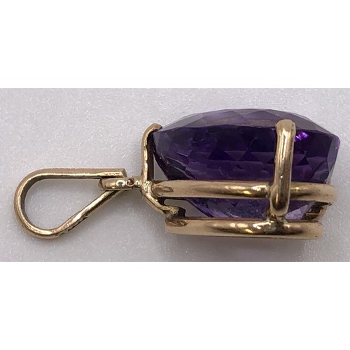 754A - A 14ct gold amethyst pendant