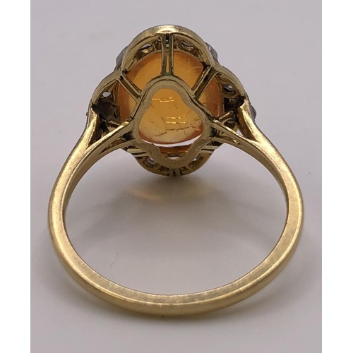 755 - An Art Deco 18ct gold and fire opal ring, ring size N