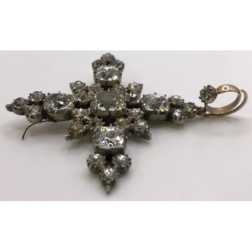 756 - A 19th century paste set cross, in a yellow coloured metal setting, 6 cm high (over suspension)