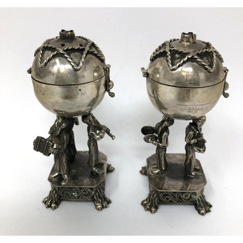 101 - Two late 19th century Russian silver pierced spheres, in figural supports, 84 standard, 1894, 8 cm h... 