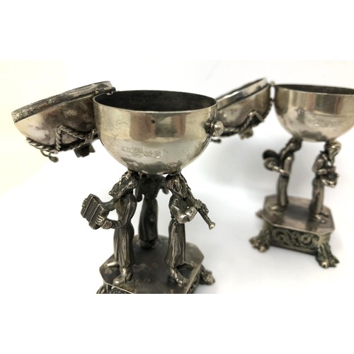 101 - Two late 19th century Russian silver pierced spheres, in figural supports, 84 standard, 1894, 8 cm h... 