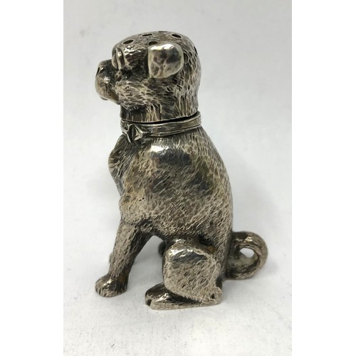 118 - A sterling silver pepperette, in the form of a Pug type dog, 1.5 ozt, 5 cm high