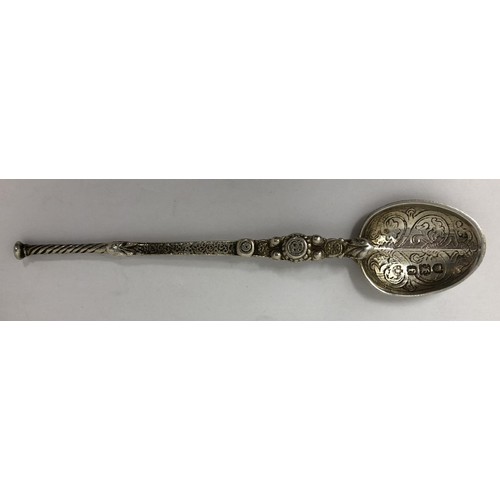 87 - Assorted silver coloured metal and other travel/commemorative spoons, some with enamel decoration