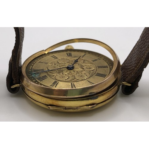 766 - A 9ct gold wristwatch, with Roman numerals, on a leather strap, in a later box, adapted from a fob w... 