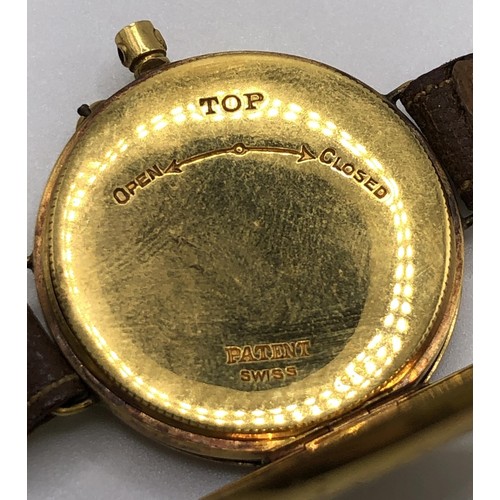 766 - A 9ct gold wristwatch, with Roman numerals, on a leather strap, in a later box, adapted from a fob w... 