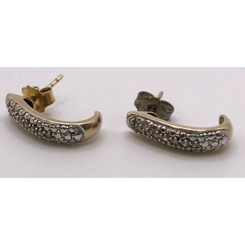 757 - A pair of 9ct gold diamond earrings