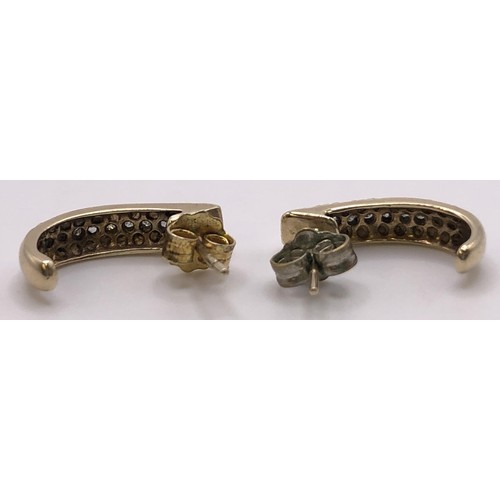 757 - A pair of 9ct gold diamond earrings