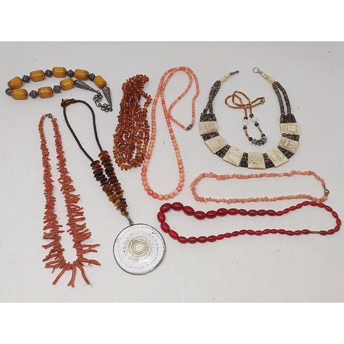 753 - An amber coloured bead necklace and assorted other costume jewellery