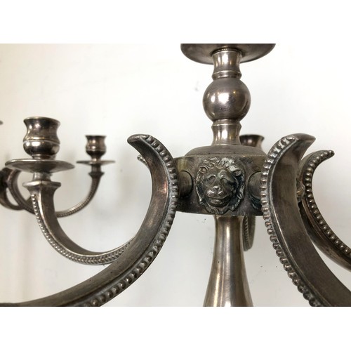 435 - A large set of four silver plated candelabra, 70 cm high (4)