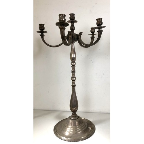 435 - A large set of four silver plated candelabra, 70 cm high (4)