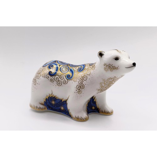 1026 - A Royal Crown Derby paperweight, Polar Bear Cub Standing, another, Imari pattern, in the form of a s... 