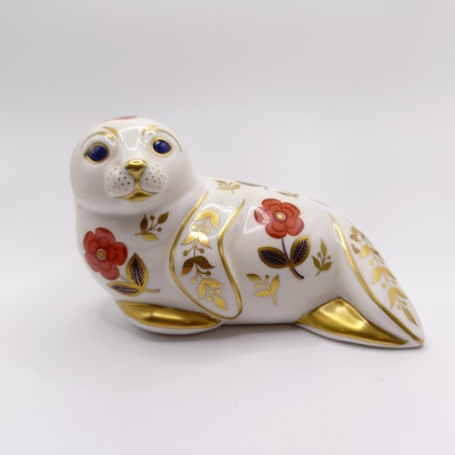 1026 - A Royal Crown Derby paperweight, Polar Bear Cub Standing, another, Imari pattern, in the form of a s... 