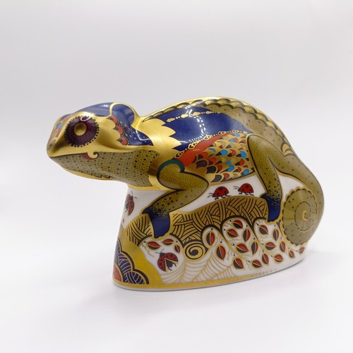 1027 - A Royal Crown Derby paperweight, in the form of a chameleon, another in the form of a penguin, and a... 