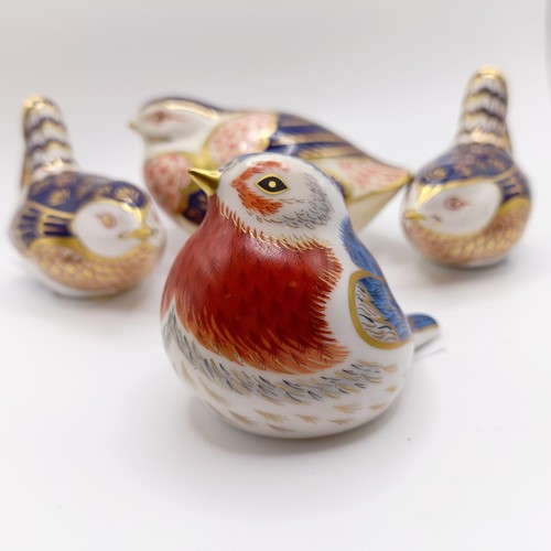 1028 - A Royal Crown Derby Collectors Guild Duckling paperweight, Anniversary Robin paperweight, a bird pap... 