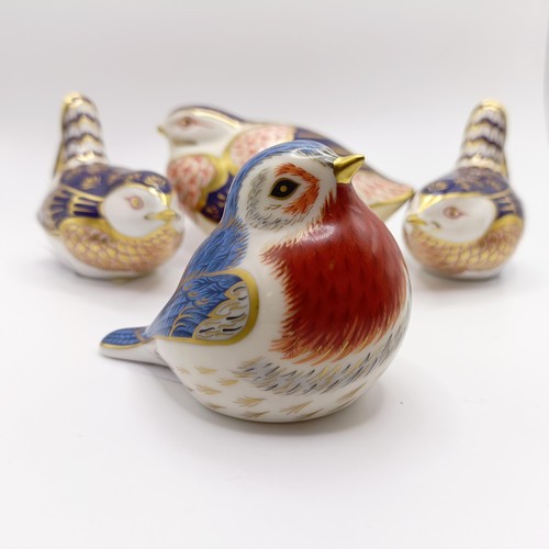 1028 - A Royal Crown Derby Collectors Guild Duckling paperweight, Anniversary Robin paperweight, a bird pap... 