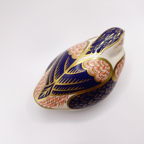 1028 - A Royal Crown Derby Collectors Guild Duckling paperweight, Anniversary Robin paperweight, a bird pap... 