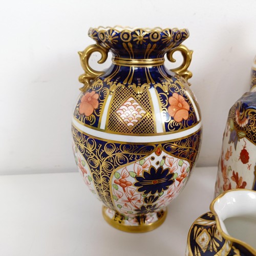 1030 - A Royal Crown Derby Imari pattern twin handled vase, 20 cm, two other vases, 10 cm and 23 cm high, a... 