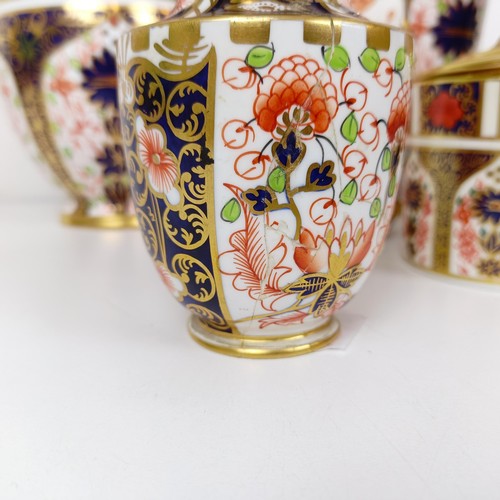 1030 - A Royal Crown Derby Imari pattern twin handled vase, 20 cm, two other vases, 10 cm and 23 cm high, a... 