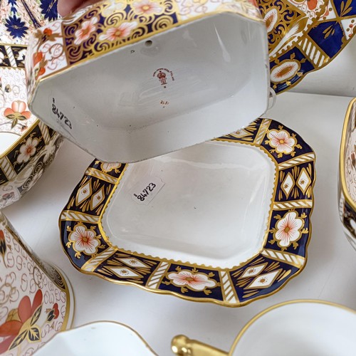 1031 - A Royal Crown Derby Imari pattern butter dish, a sucrier, a lidded trinket box, a tankard, two octag... 