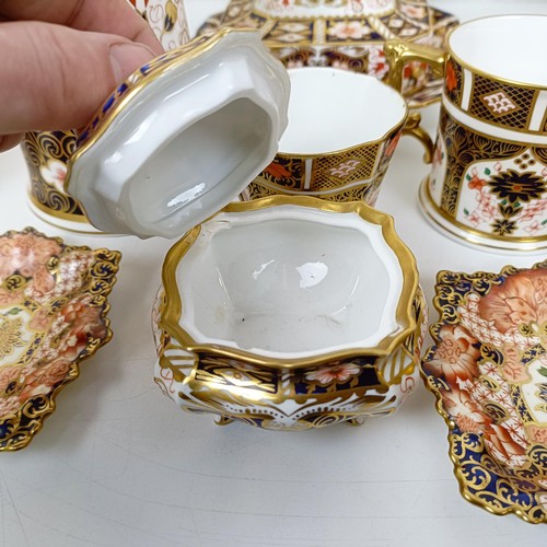 1031 - A Royal Crown Derby Imari pattern butter dish, a sucrier, a lidded trinket box, a tankard, two octag... 