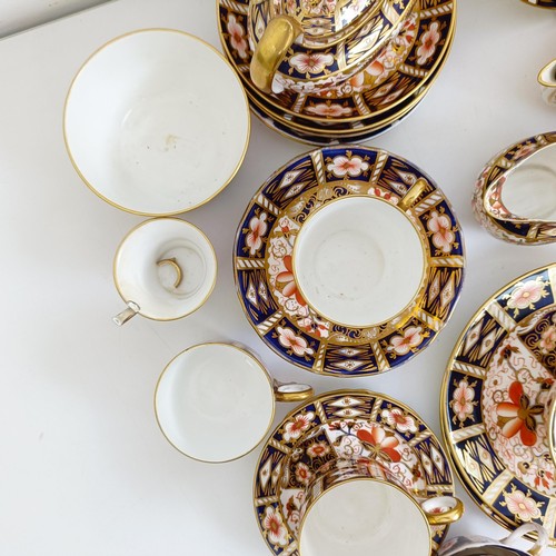 1033 - A Royal Crown Derby Imari pattern part tea service, comprising a teapot, two tureens, two cream jugs... 