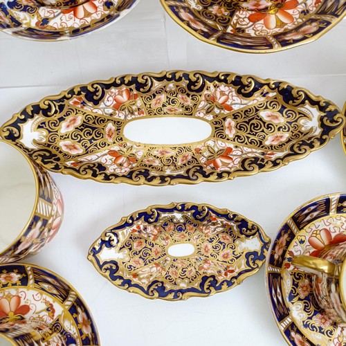 1034 - A Royal Crown Derby Imari pattern part tea service, comprising a teapot, a cream jug, two dishes, an... 