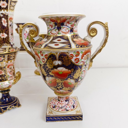 1036 - A Crown Derby Imari pattern twin handled vase, 24 cm high, a chalice, 12.5 cm high, a vase, 17 cm hi... 