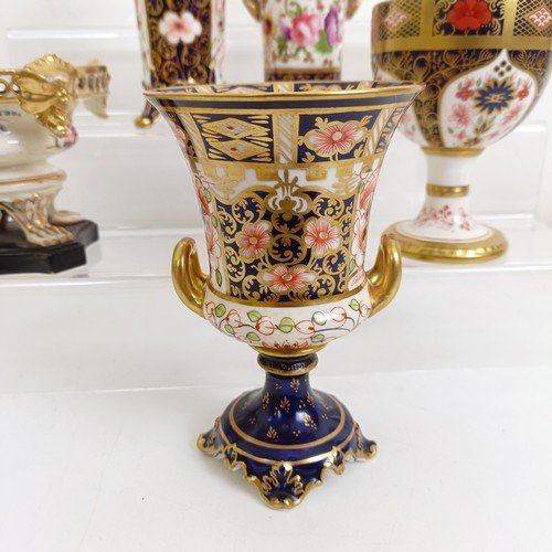 1036 - A Crown Derby Imari pattern twin handled vase, 24 cm high, a chalice, 12.5 cm high, a vase, 17 cm hi... 