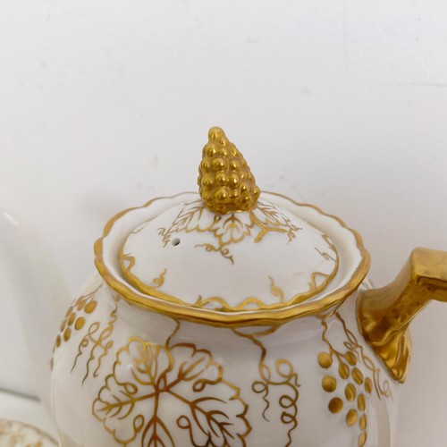 1037 - A Royal Crown Derby Vine pattern part tea service, comprising a teapot, six teacups, and six saucers... 