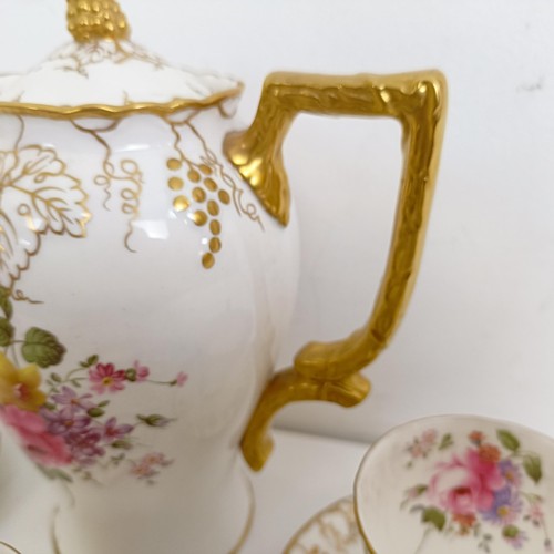 1037 - A Royal Crown Derby Vine pattern part tea service, comprising a teapot, six teacups, and six saucers... 