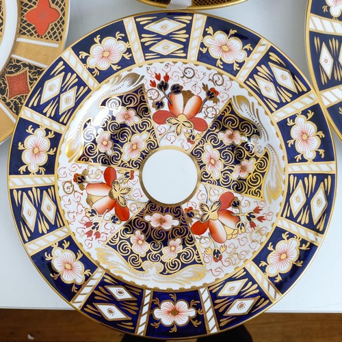 1038 - A Royal Crown Derby Old Imari holiday plate, a Yorkshire Rose plate, and eleven other Imari pattern ... 