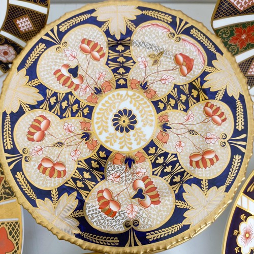 1038 - A Royal Crown Derby Old Imari holiday plate, a Yorkshire Rose plate, and eleven other Imari pattern ... 