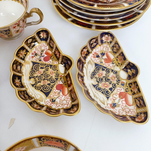 1040 - A Royal Crown Derby Imari pattern miniature coal scuttle, pattern 6299, two serving trays, two oval ... 