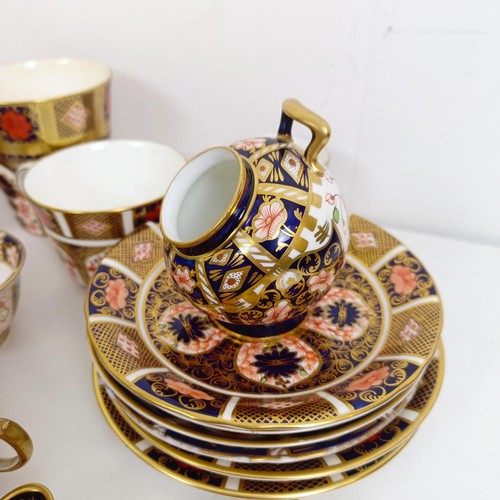 1040 - A Royal Crown Derby Imari pattern miniature coal scuttle, pattern 6299, two serving trays, two oval ... 